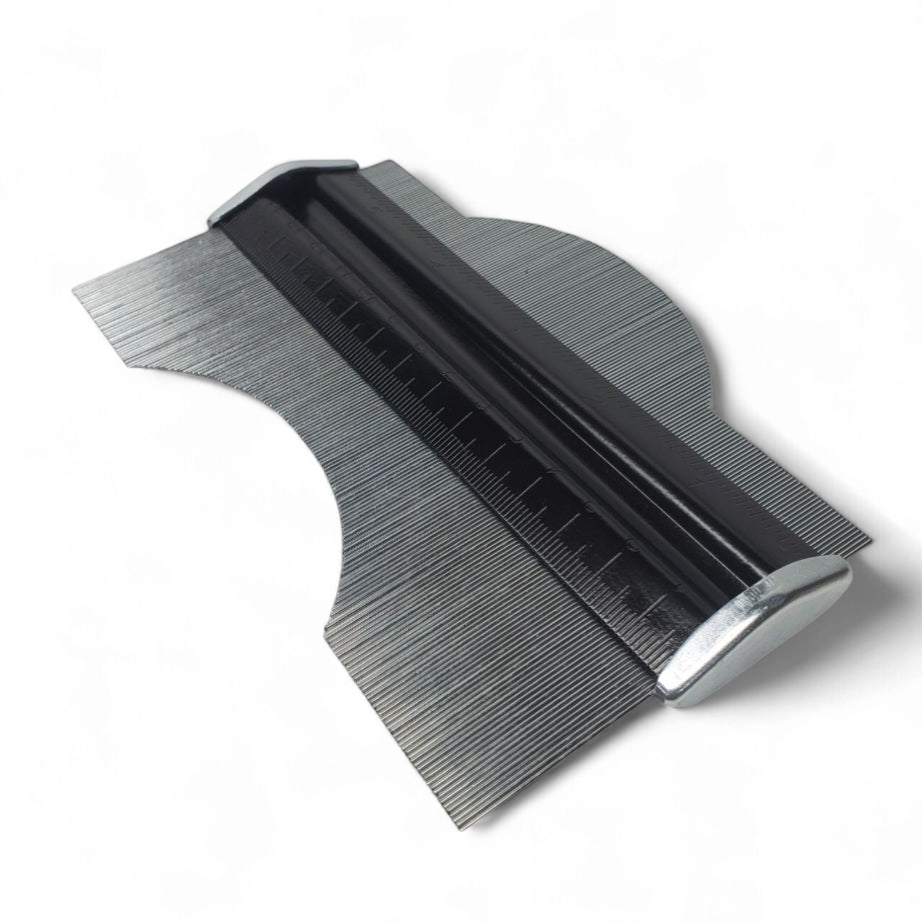 6-inch steel profile gauge pressed against a curved surface to show how fine stainless pins capture accurate contours – ideal for sheet metal fabrication, woodworking, and modeling.