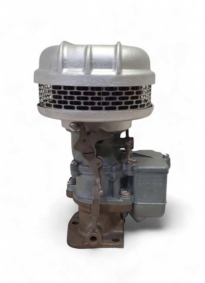 Stromberg 97 air cleaner vertical view showing finned cast-aluminum housing and carburetor assembly