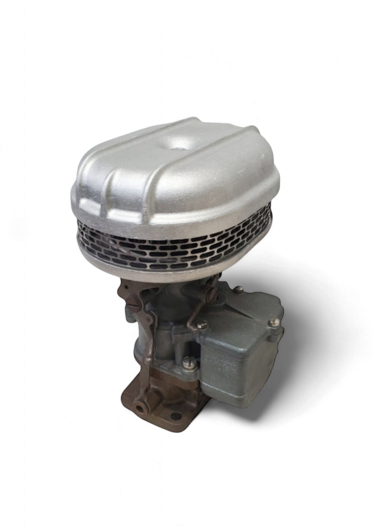 Stromberg 97 air cleaner angled view with raw cast finish showing carburetor assembly and finned housing