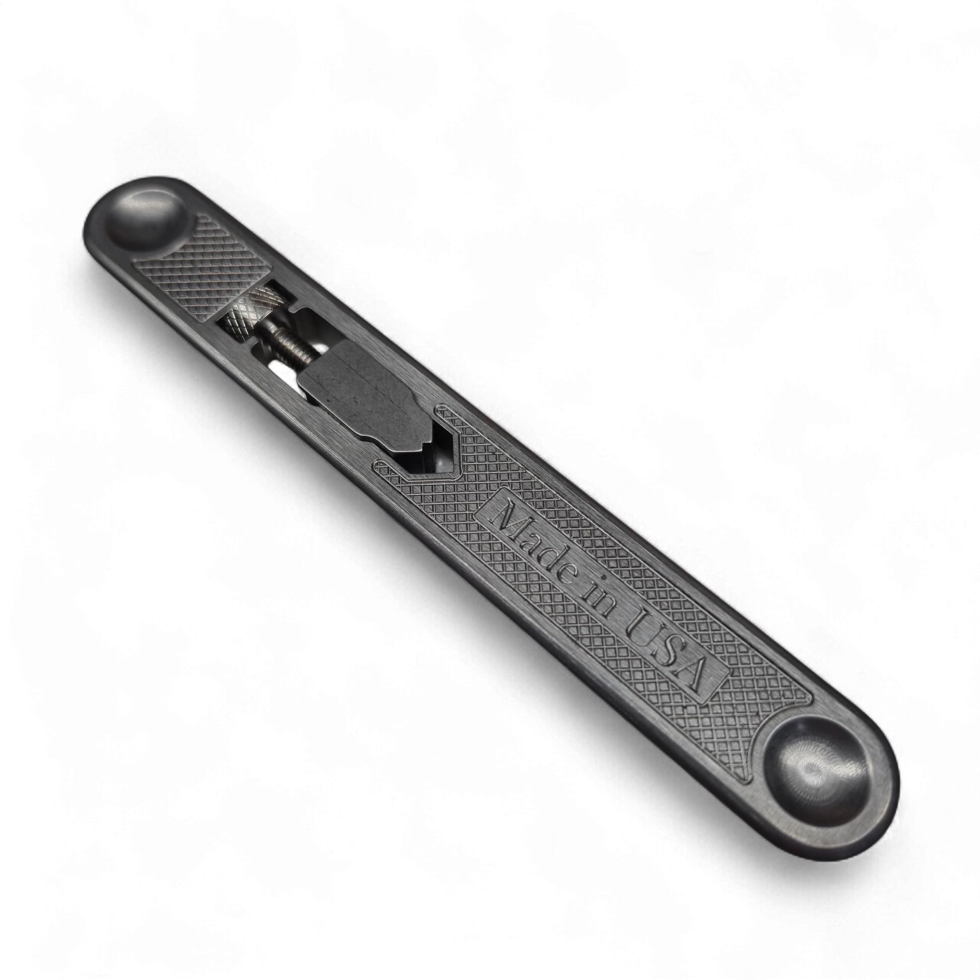 Close-up of the 5″ mini tap wrench holding a tap, showing knurled grip and sturdy construction – ideal for model makers and engine builders for threading small holes.