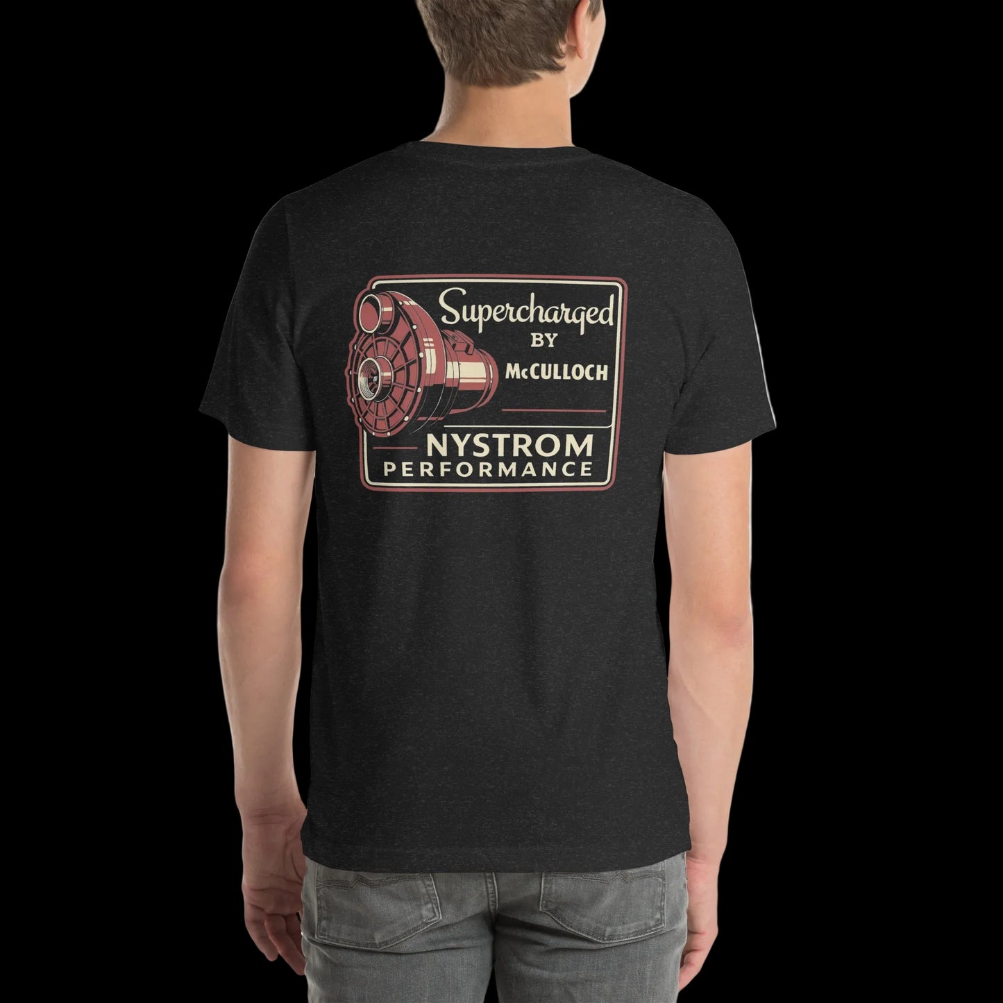 Supercharged by McCulloch T-shirt black heather back view featuring a large vintage supercharger illustration with “Supercharged by McCulloch” and “Nystrom Performance” text printed on the back of a soft cotton tee.